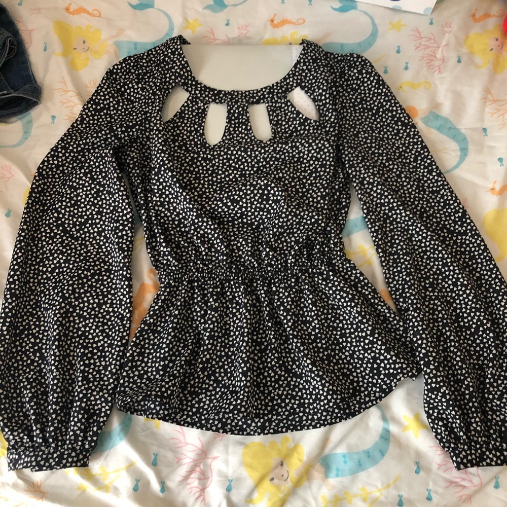Black and off-white cut-out peplum blouse